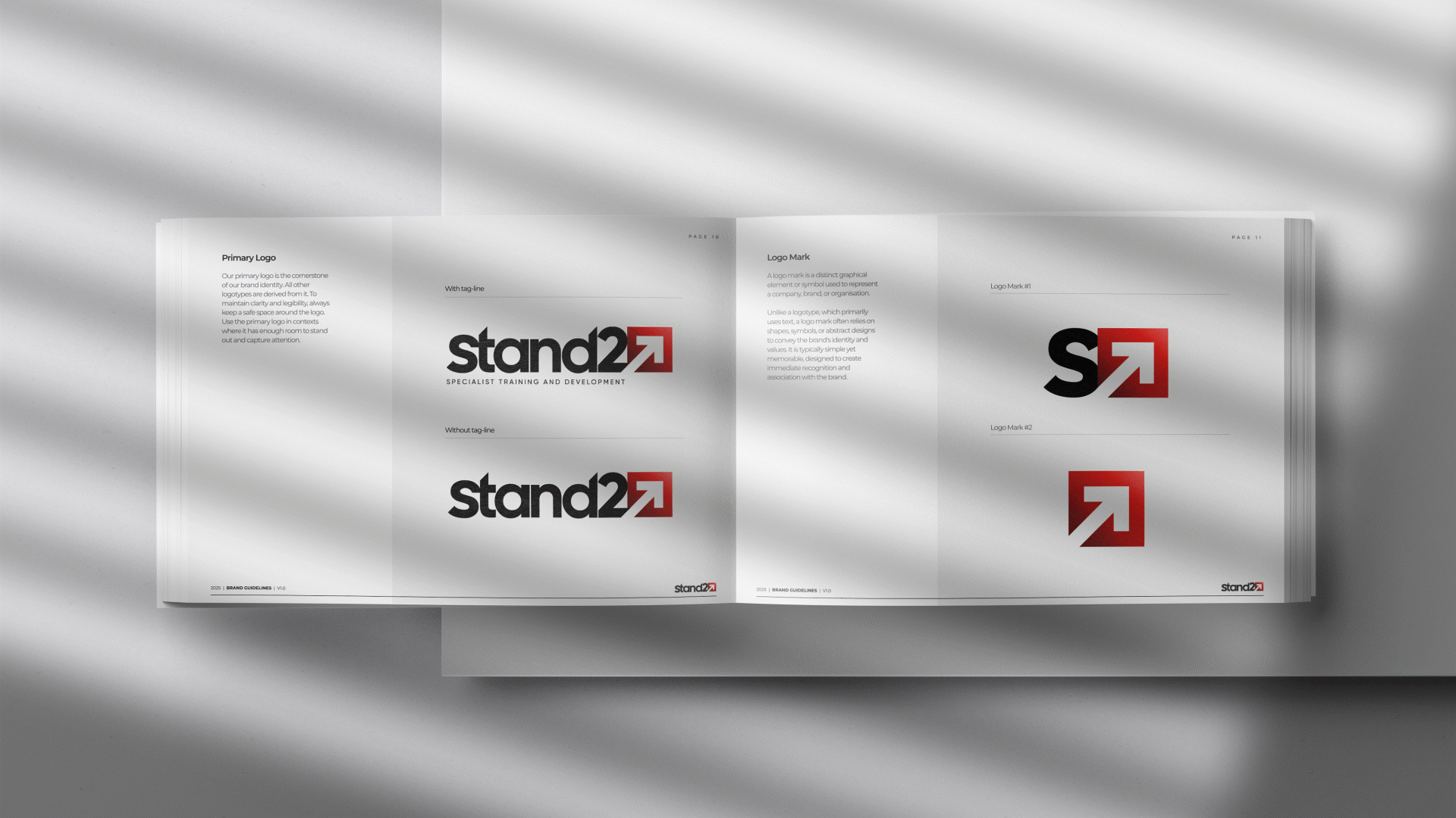 Stand2 brand guidelines displayed in an open book